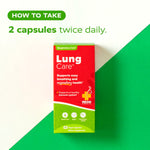A box of Redd Clinical Lung Care dietary supplement stands upright on a white background with a green diagonal shape behind it. Green text at the top reads 'HOW TO TAKE 2 capsules twice daily.